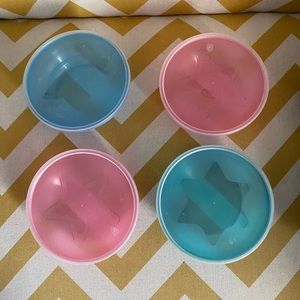 4 colored plastic bowls with lids